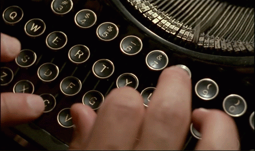 finders hitting old typewriter keys animated gif