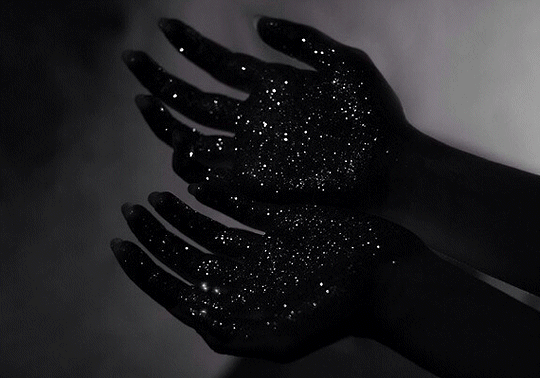 hands holding stars gif