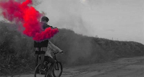 Bike Riding With Red Smoke