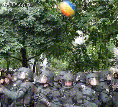 Beach Ball In Police Crowd