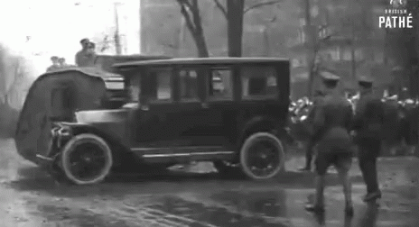 Vintage Tank Driver Over Car